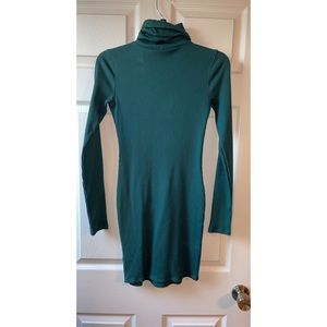 Green fitted turtleneck dress
